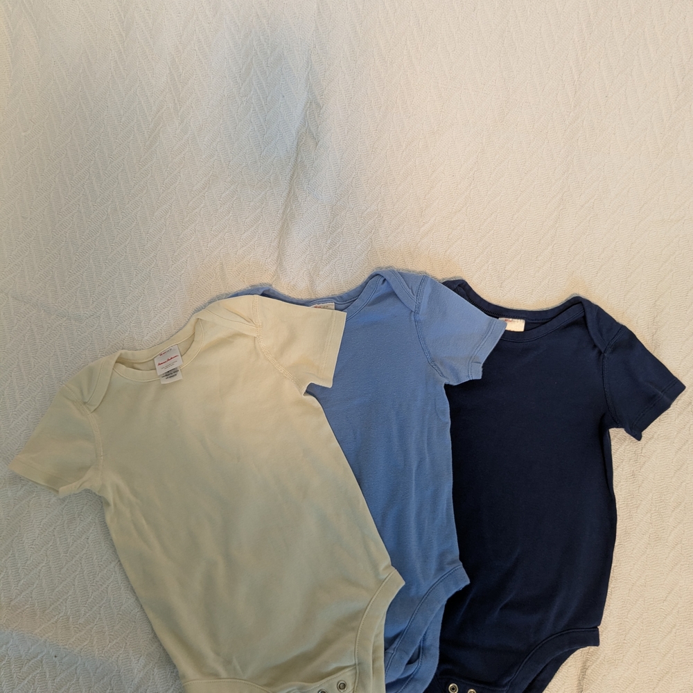 3 Pieces Hanna Andersson Ecru, Light Blue, and Navy Bodysuits